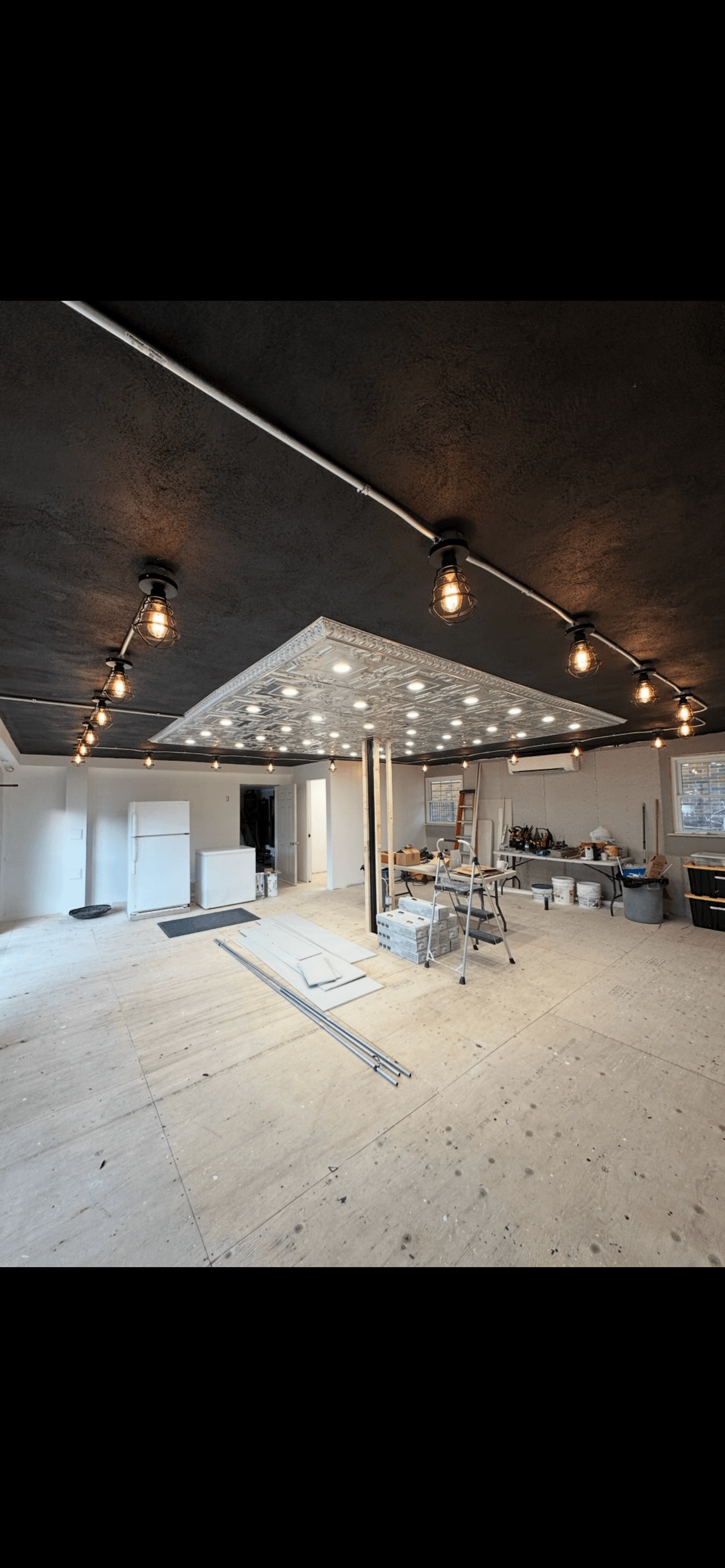 Commercial feature lighting installation by Mikaly Electric in a hospitality-style interior